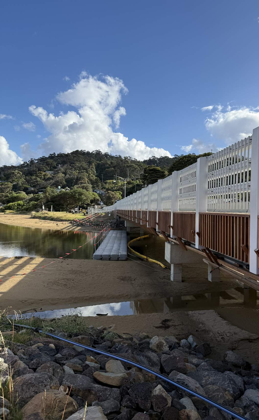 Completed Wye River bridge with timber screening over the river